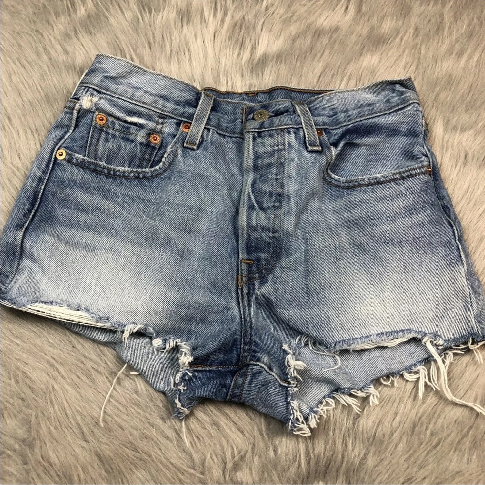 Levi’s frayed distressed shorts 501